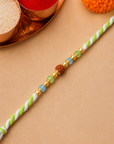 Pearl Maroon Traditional Rakhi