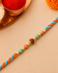 Pearl Maroon Traditional Rakhi